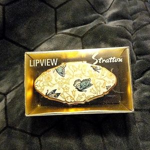 This is a case to hold your lipstick made in Sraton England back in 1970.